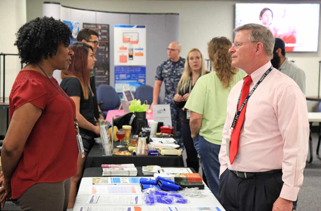 MARMC employees engage with vendors during the third annual Health and Fitness Fair, hosted by MARMC’s Health and Fitness Council, in Building LF-18’s Command Break Room, Mar. 1. (Photo by Shelby West, Public Affairs Specialist)