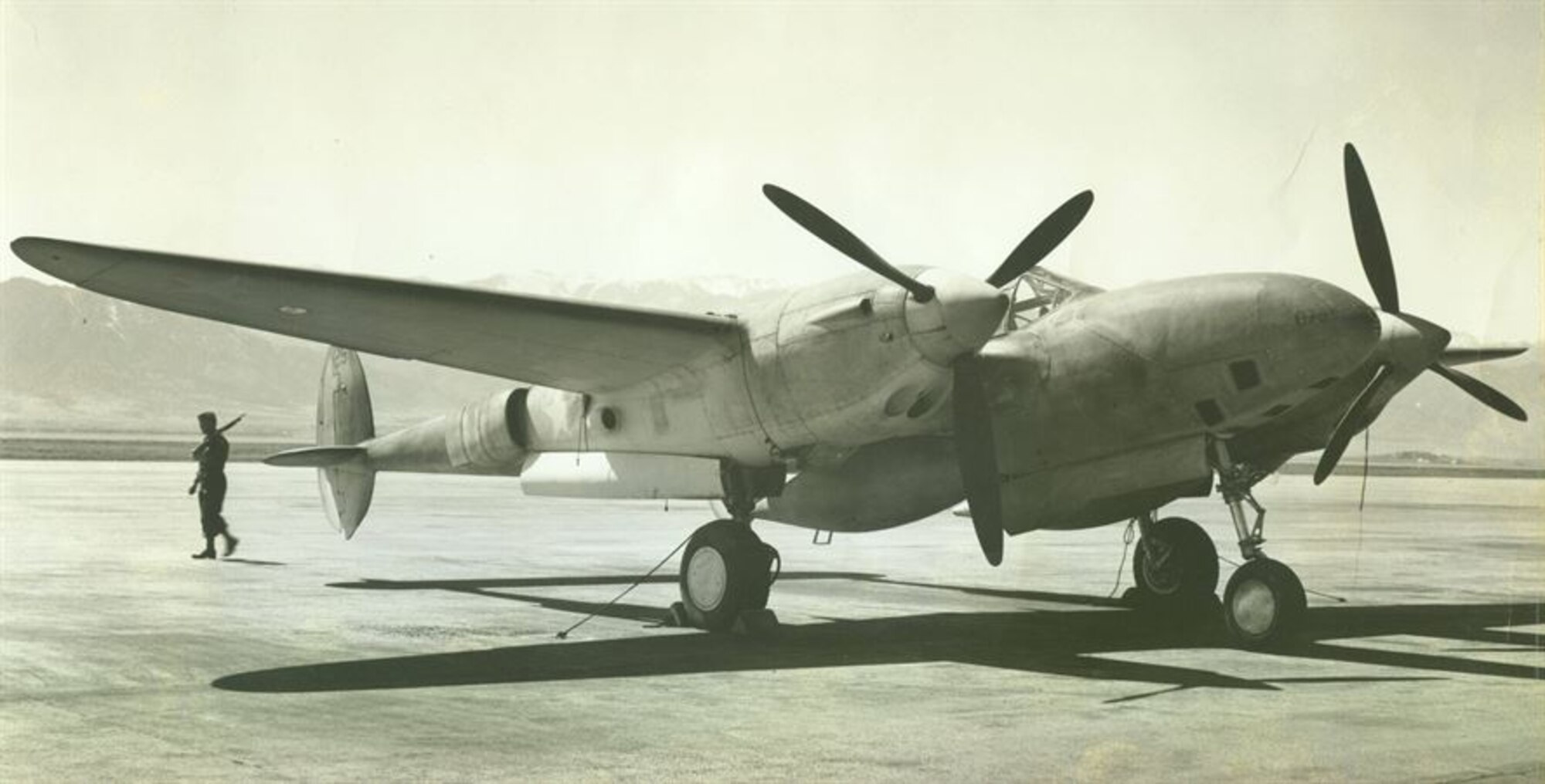 An F-4 “Photo Lightning” is guarded by U.S. Army Air Corp security members circa 1940s. The F-4 was flown by 1st Lt. Edward Peterson when he crashed on Aug. 8, 1942, while serving as a pilot in the Army Air Forces at Colorado Springs Air Base. The base was later renamed in his honor. (Photo courtesy of Peterson Museum)