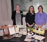 Lynn Woods and Wendy Auerbach from the Holocaust Commission of the United Jewish Federation of Tidewater are joined by Mary Powell of Combat Direction Systems Activity, Dam Neck, at CDSA’s Holocaust Commemoration on Apr. 24, 2017. The presentation focused on Holocaust survivor Hanns Loewenbach, who settled in Hampton Roads, Va. 