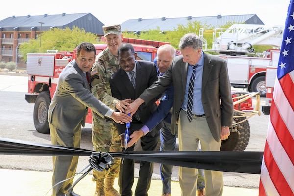 Maj. Gen. Scott D. Berrier, commanding general, U.S. Army Intelligence Center of Excellence and Fort Huachuca, joins Acting Director of the Bureau of Land Management Mike Nedd (center) in the ribbon-cutting ceremony officially opening the new operating base for BLM's Aravaipa Veteran Firefighting Crew on Fort Huachuca, Arizona April 28. Pictured from left to right are BLM Arizona State Director Raymond Suazo, Berrier, Nedd, BLM Gila District Manager Scott Feldhausen and BLM Assistant Director, Fire and Aviation Ron Dunton.