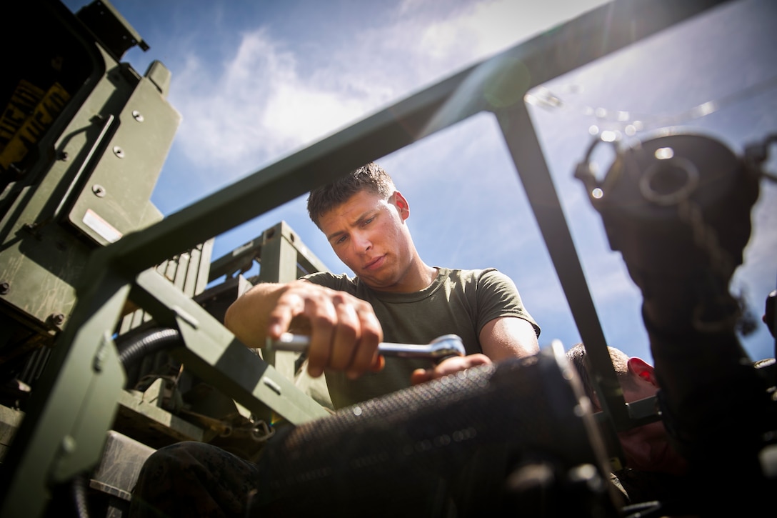 MARINE CORPS BASE CAMP PENDLETON, Calif. – Cpl. Connor Schroeder, a water support technician with Combat Logistics Battalion 15, 15th Marine Expeditionary Unit, make adjustments to a 152 water pump during a refilling water mission part of PHIBRON-MEU integration training at Camp Pendleton, April 6, 2017.  This first at-sea exercise provides the Marines the opportunity to practice integrating with their Navy counterparts to form an efficient team capable of accomplishing a range of missions around the globe. This Navy-Marine Corps team supports combatant commanders in maintaining regional maritime security and stability while providing offshore options to deter influence and win in an era of uncertainty.  (U.S. Marine Corps photo by Cpl. Frank Cordoba)