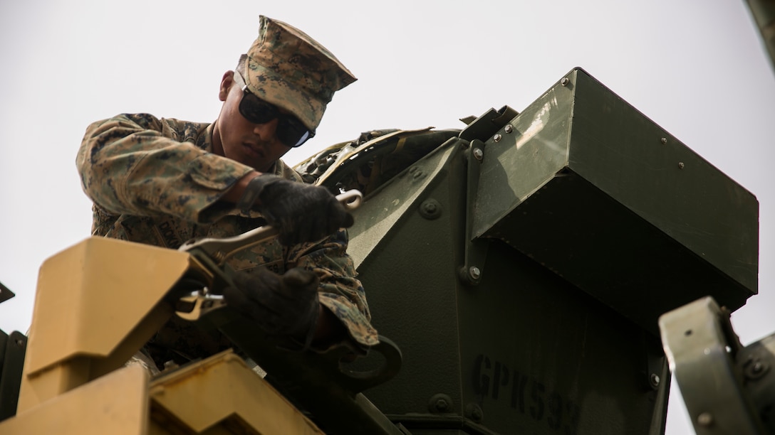 MARINE CORPS BASE CAMP PENDLETON, Calif. – Cpl. Marlon Diokno a motor transportation operator with Combat Logistics Battalion 15, 15th Marine Expeditionary Unit,   loosens a screw from a turret station during PHIBRON-MEU integrated training at Camp Pendleton, April 9, 2017. This first at-sea exercise provides the Marines the opportunity to practice integrating with their Navy counterparts to form an efficient team capable of accomplishing a range of missions around the globe. This Navy-Marine Corps team supports combatant commanders in maintaining regional maritime security and stability while providing offshore options to deter influence and win in an era of uncertainty. (U.S. Marine Corps photo by Cpl. Frank Cordoba)