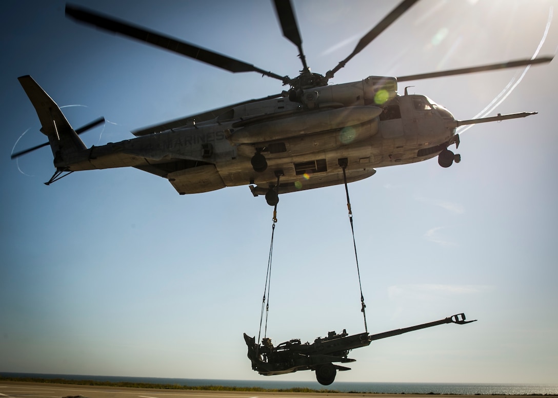 MARINE CORPS BASE CAMP PENDLETON, Calif. – A CH53E Super Stallion helicopter lifts a M777 howitzer during PHIBRON-MEU integration training at Camp Pendleton, April 12, 2017. The CH-53E Super Stallion makes the MEU that much more capable as it is able to move personnel, equipment, and vehicles from ship to shore, demonstrating the 15th MEU's ship-to-shore connector capabilities. PMINT lays the foundation for all the elements of the MEU to develop relationships with their Navy counterparts and gain an understanding of the teamwork required to accomplish the mission. (U.S. Marine Corps photo by Cpl. Frank Cordoba)