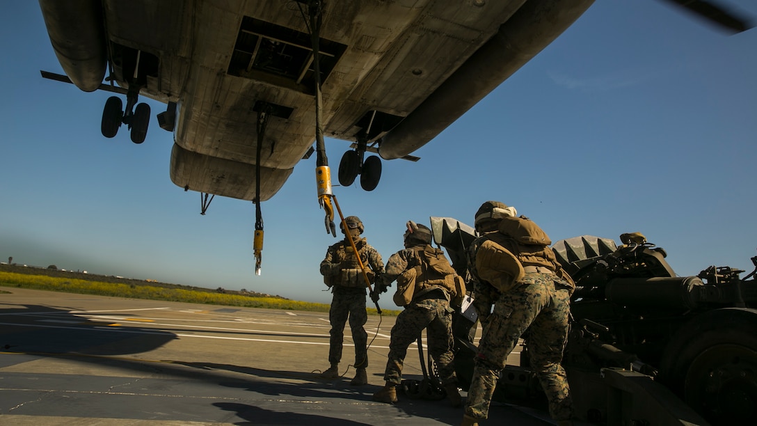 MARINE CORPS BASE CAMP PENDLETON, Calif. – Marines with Combat Logistics Battalion 15, 15th Marine Expeditionary Unit, lift a M777 Howitzer during PHIBRON-MEU integration training at Camp Pendleton, April 12, 2017. The CH-53E Super Stallion makes the MEU that much more capable as it is able to move personnel, equipment, and vehicles from ship to shore, demonstrating the 15th MEU's ship-to-shore connector capabilities. PMINT lays the foundation for all the elements of the MEU to develop relationships with their Navy counterparts and gain an understanding of the teamwork required to accomplish the mission. (U.S. Marine Corps photo by Cpl. Frank Cordoba)