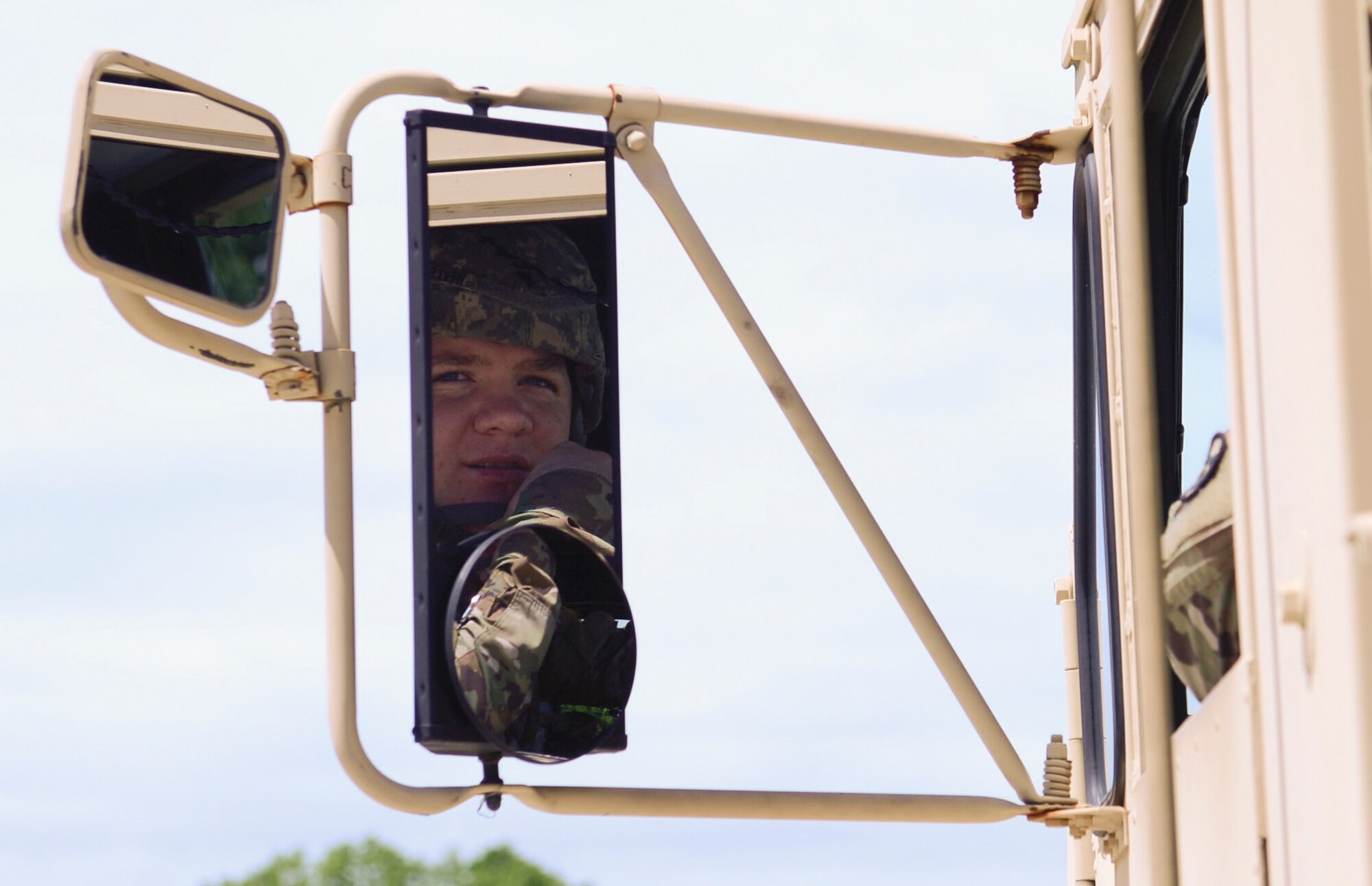 U.S. Army Spc. Cody Wells, 688th Rapid Port Opening Element motor transport operator, prepares to load cargo using a load handling system truck during an exercise at Joint Base Langley-Eustis, Va., April 26, 2017. The exercise required Soldiers to load large bundles of cargo onto a truck and transport them to a separate base camp. (U.S. Air Force photo/Airman 1st Class Kaylee Dubois)