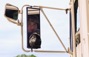 U.S. Army Spc. Cody Wells, 688th Rapid Port Opening Element motor transport operator, prepares to load cargo using a load handling system truck during an exercise at Joint Base Langley-Eustis, Va., April 26, 2017. The exercise required Soldiers to load large bundles of cargo onto a truck and transport them to a separate base camp. (U.S. Air Force photo/Airman 1st Class Kaylee Dubois)