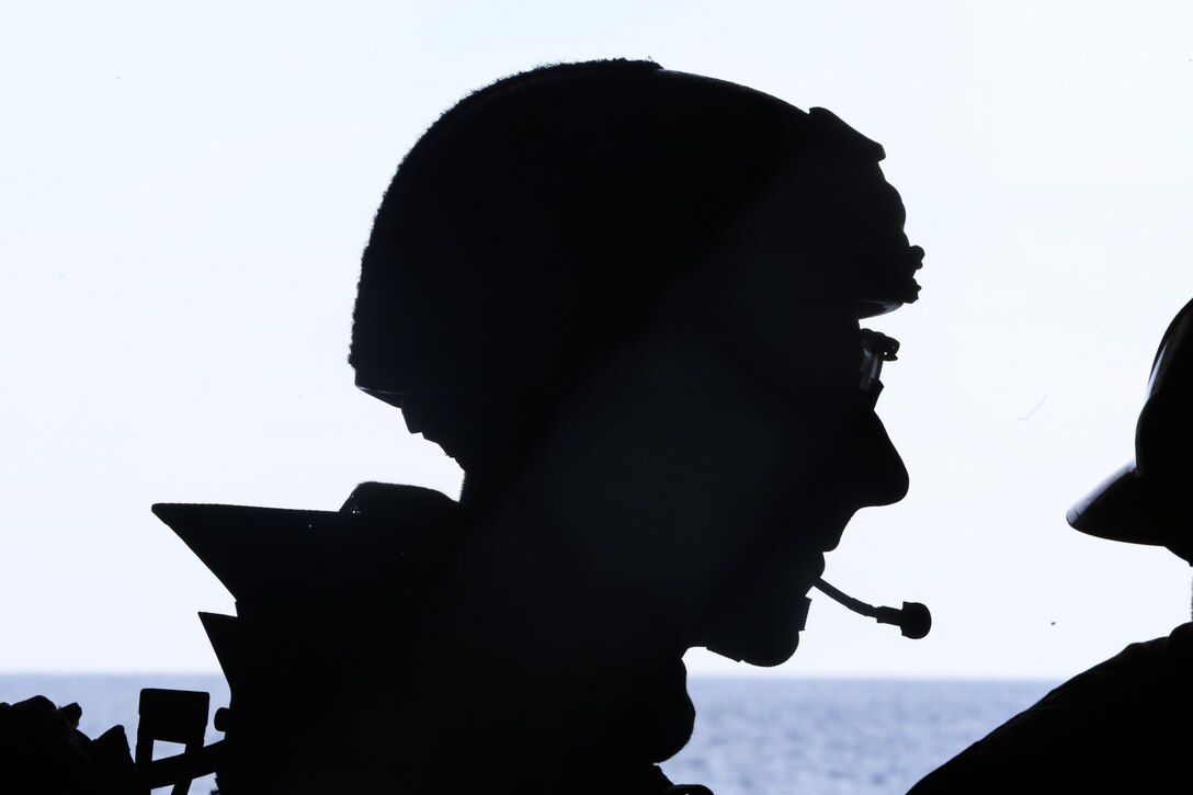 PACIFIC OCEAN, Calif., – A Marine with the 15th Marine Expeditionary Unit, Maritime Raid Force waits aboard the USS San Diego (LPD-22) to load on to a rigid haul inflatable boat to conduct a vessel board search and seizure mission during PHIBRON-MEU Integration, April 7, 2017. VBSS missions are conducted on hostile vessels to capture high value individuals along with collect intelligence to aid future missions. The 15th MEU undergoes demanding unit-level certification in order to be proficient in rapidly mobilize people and equipment to make the amphibious forces postured to respond to any mission. (U.S. Marine Corps photo by Cpl. Timothy Valero)