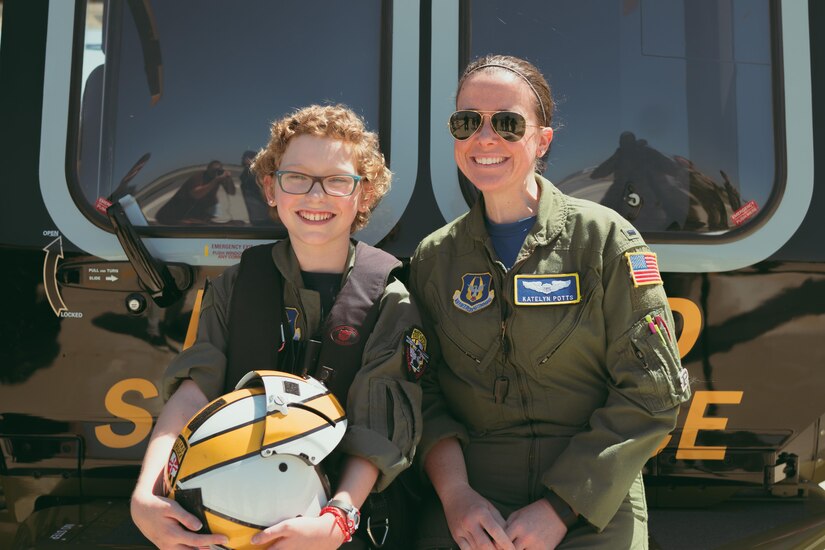 Carolyn Shaffer, left, Pilot for a Day participant, and 1st Lt. Katelyn Potts, 459th Air Refueling Wing KC-135 pilot, pose for a photo at Joint Base Andrews, Md., April 28, 2017. Guided by Potts and volunteers from numerous squadrons and organizations, Carolyn donned a personalized flight suit and flew a UH-1N Iroquois simulator, toured multiple aircraft including an F-16 Fighting Falcon and KC-135 Stratotanker, and participated in a variety of base demonstrations. (U.S. Air Force photo by Senior Airman Delano Scott)