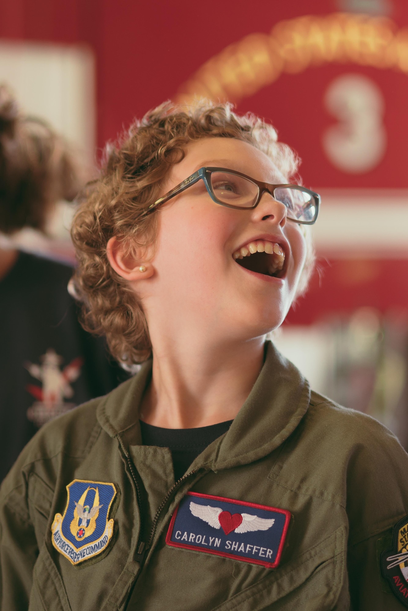 Carolyn Shaffer, Pilot for a Day participant, tours an 11th Civil Engineer Squadron fire station at Joint Base Andrews, Md., April 28, 2017. To honor and highlight Shaffer’s battle against cancer, JBA teamed up with the Check-6 Foundation, a local non-profit, to make her Pilot for a Day. As part of the program, Shaffer donned a personalized flight suit and flew a UH-1N Iroquois simulator, toured multiple aircraft including an F-16 Fighting Falcon and KC-135 Stratotanker, and participated in a variety of base demonstrations. (U.S. Air Force photo by Senior Airman Delano Scott)