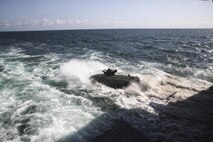 PACIFIC OCEAN, Calif., – An Assault Amphibious Vehicle with the 15th Marine Expeditionary Unit Battalion Landing Team drive off the edge of the USS SAN DIEGO’s (LPD-22) well deck to conduct amphibious training during PHIBRON-MEU Integration, April 8, 2017. PMINT is the 15th MEU’s first at-sea training exercise integrating with the Navy to accomplish mission critical tasks. The distinct ability of amphibious forces to gain access to critical areas anywhere in the world with ground, air, and logistics forces enables the Navy-Marine Corps team to shape actions across the range of military operations. (U.S. Marine Corps photo by Cpl. Timothy Valero)