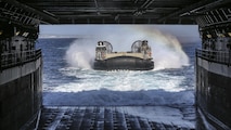 PACIFIC OCEAN, Calif., –  A Landing Craft, Air Cushion with Navy Assault Craft Unit 5 approaches the well deck of the USS San Diego (LPD-22) during PHIBRON-MEU Integration, April 8, 2017. PMINT is the first at-sea training exercise and an opportunity for the Marines and Sailors to work as one team to complete essential missions.  This exercise lays the foundation for all the elements of the 15th MEU to develop relationships with their Navy counterparts and gain an understanding of the teamwork necessary to accomplish the mission with a focus on facilitating the integration of the blue-green team. (U.S. Marine Corps photo by Cpl. Timothy Valero)