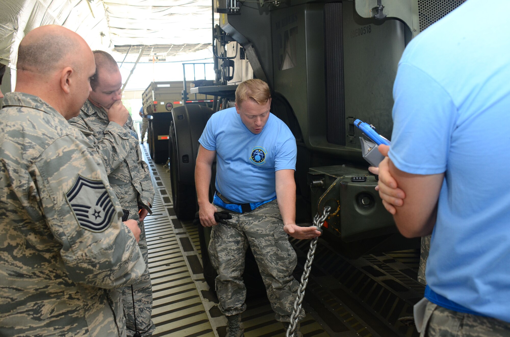 Members from different aerial port squadrons in the Air Force Reserve Command compete in the Port Dawg Challenge at Dobbins Air Reserve Base, Georgia, April 25-27, 2017. The challenge included cargo transport and many obstacle course-style challenges to encourage teamwork and promote real-time training. (U.S. Air Force photo/ Don Peek)