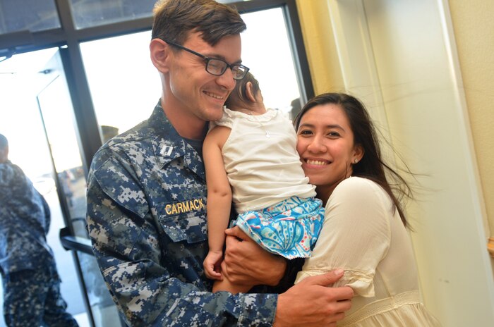Lt. Jonathan Carmack, a sailor attached to Naval Health Clinic Charleston, is met by his family upon arrival at Naval Air Station Jacksonville, April 2, 2017, following a successful Continuing Promise 2017 (CP-17) deployment. CP-17 is a U.S. Southern Command-sponsored and U.S. Naval Forces Southern Command/ U.S. 4th Fleet-conducted deployment to conduct civil-military operations including humanitarian assistance and humanitarian civic assistance, training engagements, medical, dental, and veterinary support and disaster response to partner nations and to show U.S. support and commitment to Central and South America. 