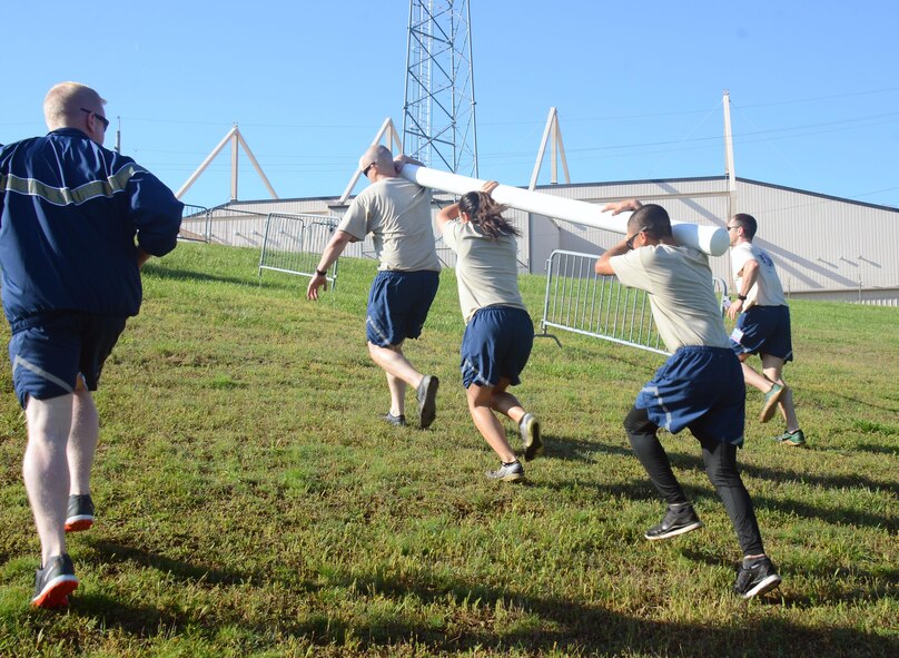 Members from different aerial port squadrons in the Air Force Reserve command compete in the Port Dawg Challenge at Dobbins Air Reserve Base, Georgia, April 25-27. The challenge included cargo transport and many obstacle course-style challenges to encourage teamwork and promote real-time training.