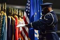 Members of the Wright-Patterson Air Force Base honor guard post the colors during a dual change of command ceremony at the National Museum of the United States Air Force, May, 2, 2017. The dual ceremonies presided over by Gen. Ellen M. Pawlikowski, Air Force Materiel Command commander, were for the Air Force Life Cycle Management Center and the Air Force Research Laboratory. (U.S. Air Force photo/Wesley Farnsworth)