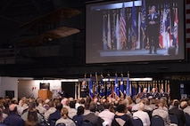 Gen. Ellen M. Pawlikowski, Air Force Materiel Command commander, gives her opening remarks colors during a unique dual change of command ceremony in the National Museum of the United States Air Force at Wright-Patterson Air Force Base, Ohio, May, 2, 2017. The ceremonies resulted in Lt. Gen. John F. Thompson relinquishing command of the Air Force Life Cycle Management Center to Lt. Gen. Robert D. McMurry Jr., who at the same time relinquished command of the Air Force Research Laboratory to Brig. Gen. William T. Cooley. (U.S. Air Force photo/ Wesley Farnsworth)