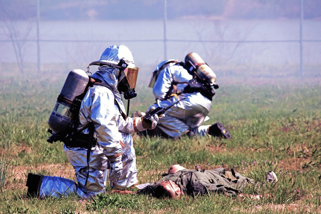 With the Burrn Bird still ablaze, Marines lay in an open field screaming for the attention of the first responders. ARFF was asked to assess the injuries of each person aboard the crashed aircraft and rate them by the severity of their injuries. The simulated injuries ranged from third degree burns to broken backs and legs.