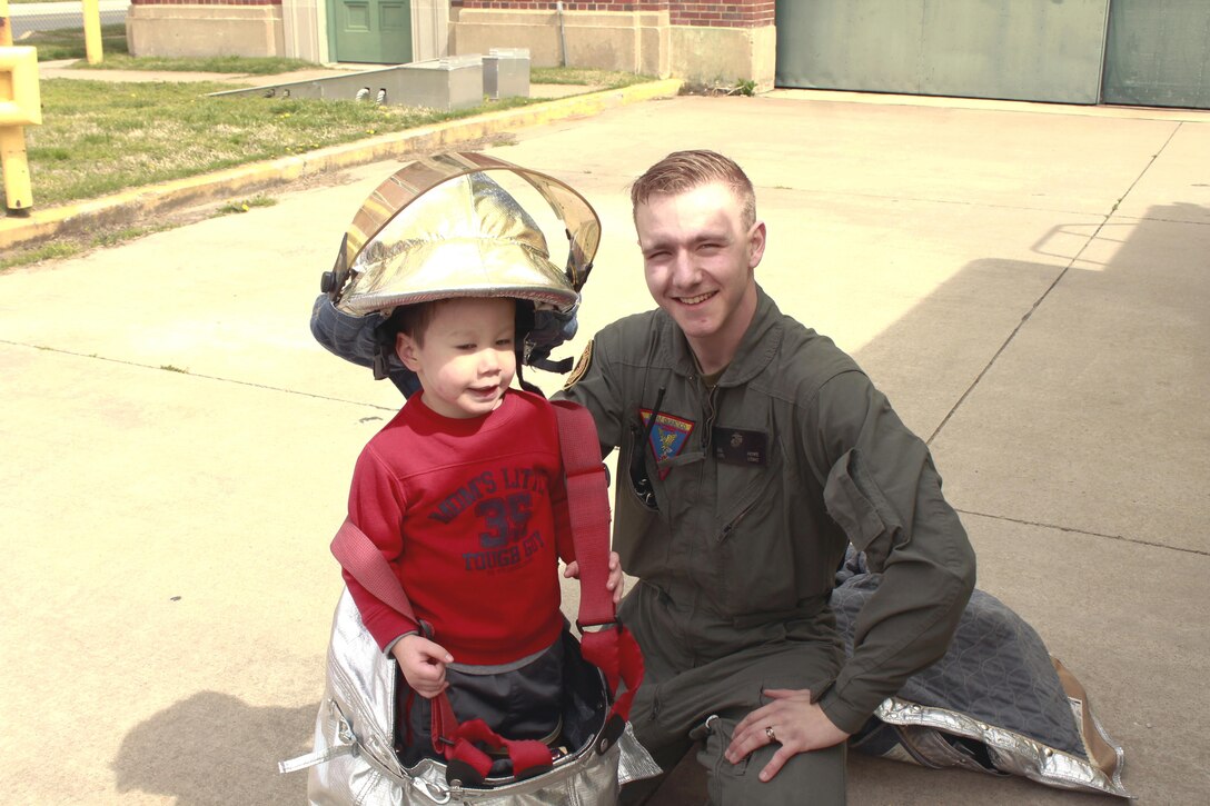 Lance Cpl. Howe prepares Elias for any emergancy situation that might occur on Marine Corps Air Facility.