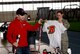 Airman 1st Class Dusty, a mission intelligence analyst assigned to the 89th Attack Squadron, wins a Rapid City Rush t-shirt during the annual Wingman Day at Ellsworth Air Force Base, S.D., April 28, 2017. Airmen participated in events such as bubble soccer, rock-wall climbing and other physical activities throughout base with a Discover The Hills event that highlighted different organizations in the Rapid City area. (U.S. Air Force photo by Airman Nicolas Z. Erwin)