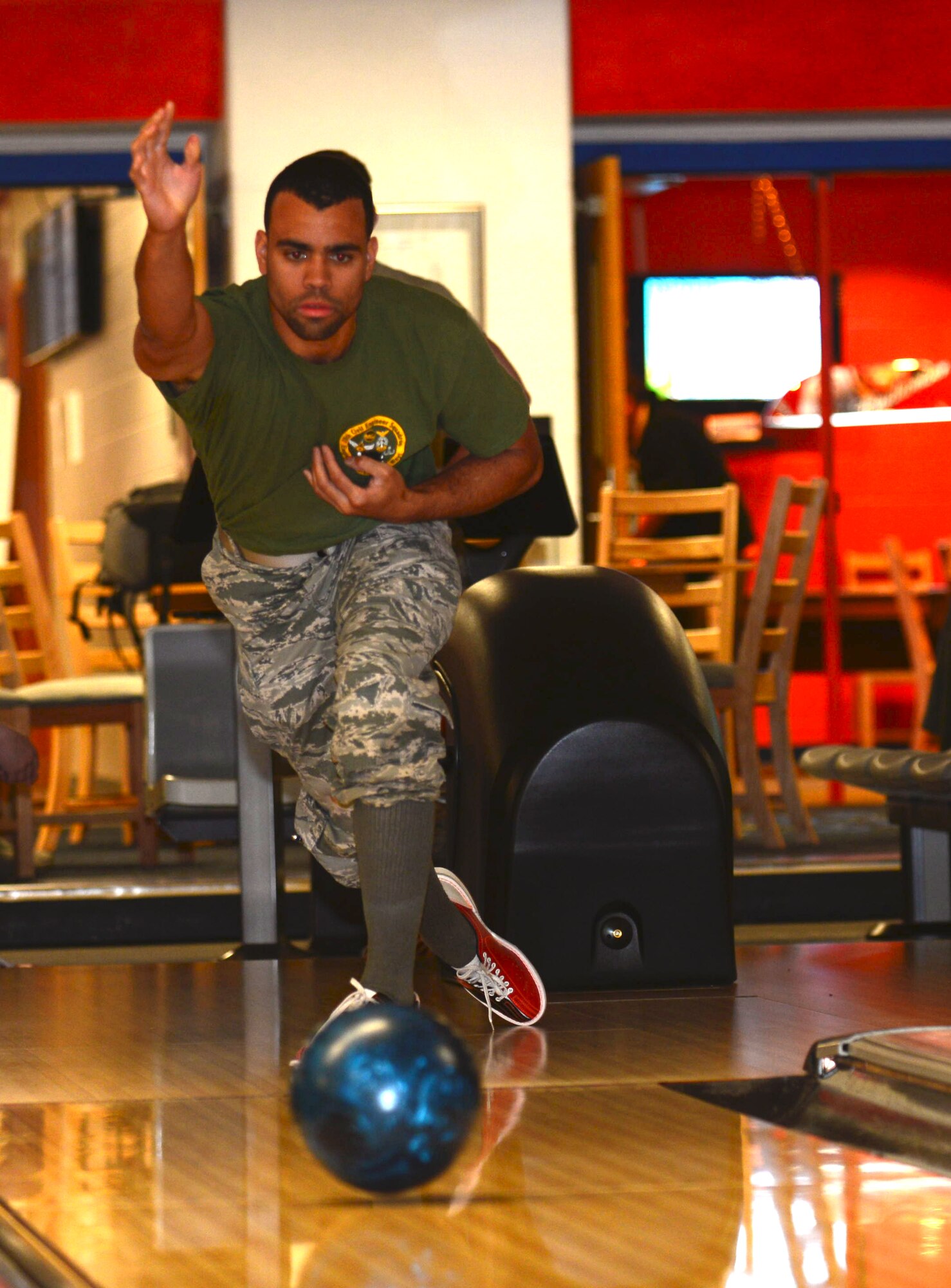 Senior Airman Alexander Craft, an operations manager assigned to the 28th Civil Engineer Squadron, bowls a strike during a Wingman Day inside the Bandits Lane Bowling Alley at Ellsworth Air Force Base, S.D., April 28, 2017. Craft and nearly 2,300 Airmen participated in the semi-annual event, focusing on developing Airmen physically and socially. (U.S. Air Force photo by Airman 1st Class Donald C. Knechtel)