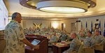Former University of Hawaii (UH) head football coach June Jones speaks with Pacific Air Forces (PACAF) senior leaders during the PACAF hosted commander's conference at Joint Base Pearl Harbor-Hickam, Hawaii, April 26, 2017. At UH, Jones guided the Rainbow Warriors to what was the biggest single-season turnaround in NCAA history, taking a program that had gone 0-12 before his arrival to 9-4 in 1999, leaving the school as the winningest head coach with a 76-41 record over nine seasons. The three-day conference included a wide variety of topics and several guest speakers, preparing leaders in PACAF to remain poised to retain a competitive advantage in the evolving Pacific theater. 