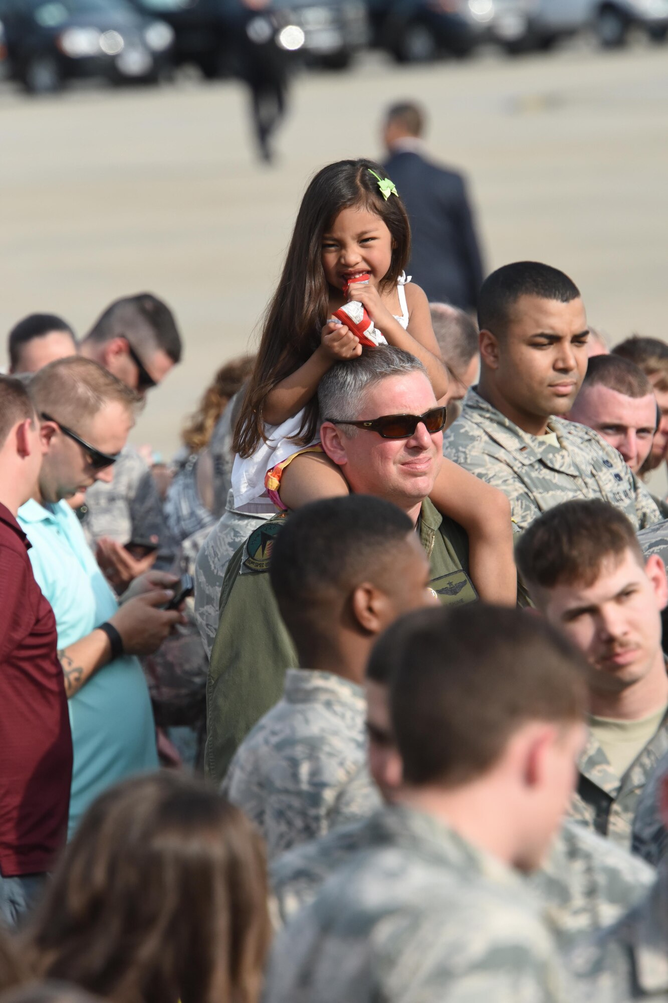 193rd Special Operations Wing Airmen, along with their family and friends, watch the arrival of Vice President Mike Pence, Middletown, Pennsylvania, April 29, 2017. The vice president and President Donald J. Trump; who arrived after the vice president; took time to shake the hands of Airmen, along with Airmen’s family and friends before departing for the Harrisburg Farm Show Complex for President Trump’s 100th day rally. (U.S. Air National Guard Photo by Master Sgt. Culeen Shaffer/Released)
