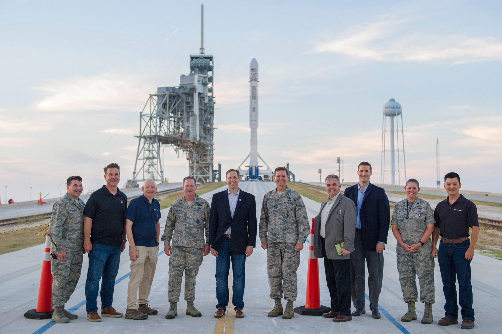 (Fourth from the left) Air Force Chief of Staff Gen. David L. Goldfein; Rep. Jim Bridenstine; Brig. Gen. Wayne Monteith, 45th Space Wing commander; members of the 45th Space Wing and SpaceX gather for a photo after touring Launch Pad 39A, April 29, 2017, at Kennedy Space Center, Fla. The tour included a visit to the Morrell Operations Center; Cape Canaveral Air Force Station Headquarters; Space Launch Complex 37; Moon Express; and a close up view of the Falcon 9 launch and landing. (U.S. Air Force photo/Matthew Jurgens)