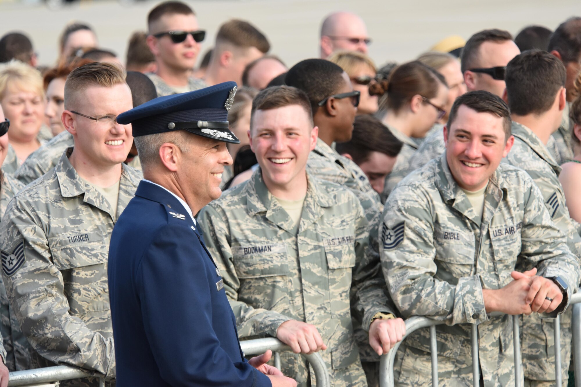 193rd Special Operation Wing Commander Benjamin “Mike” Cason and Airmen of the wing along with their family and friends, watch the arrival of their commander-in-chief, President Donald J. Trump, Middletown, Pennsylvania, April 29, 2017. The president and Vice President Mike Pence landed at the 193rd SOW and took time to shake the hands of Airmen, along with Airmen’s family and friends before departing for the Harrisburg Farm Show Complex for President Trump’s 100th day rally. (U.S. Air National Guard Photo by Master Sgt. Culeen Shaffer/Released)