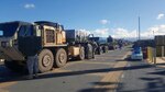 Soldiers from the 25th Composite Truck Company, 524th Combat Sustainment Support Battalion, 25th Sustainment Brigade, load pallets of ammunition onto M1075 Palletized Loading Systems for delivery from West Loch to Lualualei, Hawaii. 