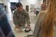 Senior Airman Garrett Olson, 92nd Civil Engineer Squadron explosive ordinance disposal journeyman, uses a mass spectrometer to identify and quantify molecules in simple mixtures such as baking soda, acetone and gasoline during a Science, Technology, Engineering and Math tour hosted by the 92nd CES May 1, 2017, at Fairchild Air Force Base, Washington. The students received numerous hands-on demonstrations including night vision goggles and robotics. (U.S. Air Force photo/Senior Airman Mackenzie Richardson)