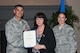 Col. Eric Shafa, 42nd Air Base Wing commander, presents Dorie Henley with the Volunteer Excellence Award on Maxwell Air Force Base, Ala., April 27, 2017.  All of the 2016 volunteers were recognized for their service and awarded certificates. (US Air Force photo by Bud Hancock)