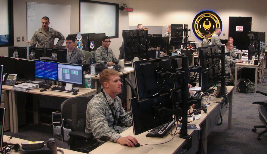 1st Space Operations Squadron Geosynchronous Space Situational Awareness and Space Based Space Surveillance crews operate satellite vehicles in the new, combined ops floor at Schriever Air Force Base, Colorado Friday, April 28, 2017. This marked the first time space situational awareness operations were brought together into one ops floor, named Mod 9. (Courtesy photo)