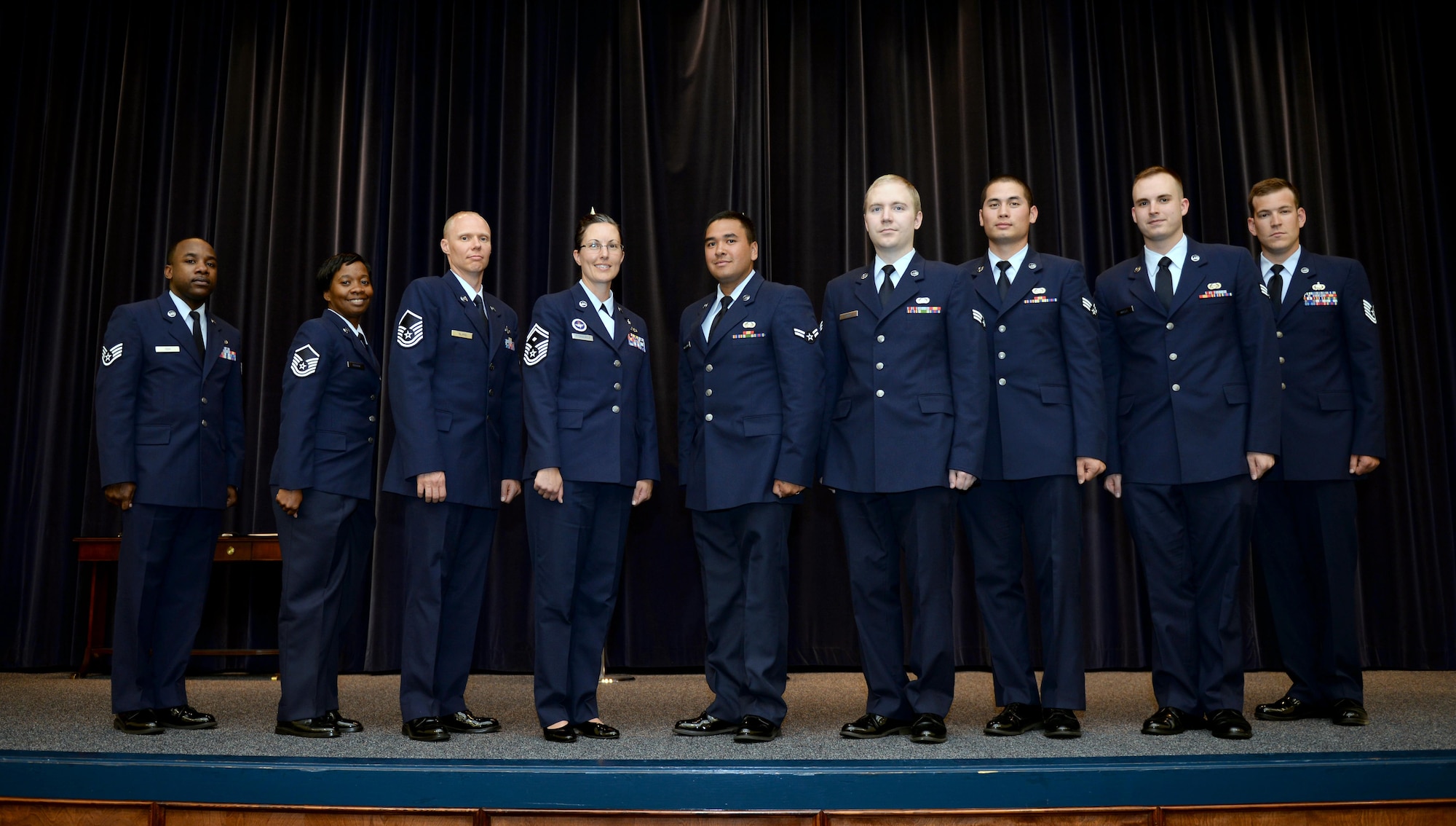 Airmen from Maxwell Air Force Base, Ala., pose for a photo during the monthly promotion ceremony, April 28, 2017. (U.S. Air Force photo/Senior Airman Tammie Ramsouer)