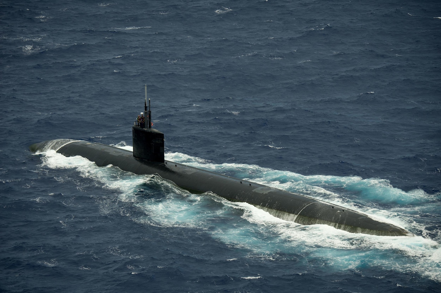 File photo from July 28, 2016:  Los Angeles-class fast-attack submarine USS Cheyenne (SSN 773) transits in close formation as one of 40 ships and submarines representing 13 international partner nations during Rim of the Pacific 2016. Twenty-six nations, more than 40 ships and submarines, more than 200 aircraft, and 25,000 personnel are participating in RIMPAC from June 30 to Aug. 4, in and around the Hawaiian Islands and Southern California. The world's largest international maritime exercise, RIMPAC provides a unique training opportunity that helps participants foster and sustain the cooperative relationships that are critical to ensuring the safety of sea lanes and security on the world's oceans. RIMPAC 2016 is the 25th exercise in the series that began in 1971. 