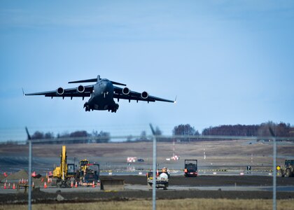 A U.S. Air Force C-17 Globemaster III  from the 517th Airlift Squadron takes off for a training mission during Northern Edge, May 2, 2017. Northern Edge 2017 is Alaska's premiere joint-training exercise designed to practice operations, techniques, and procedures as well as enhance interoperability among the services. Thousands of participants from all the services; Airmen, Soldiers, Sailors, Marines, and Coast Guard personnel from active duty, Reserve and National Guard units, are involved. 