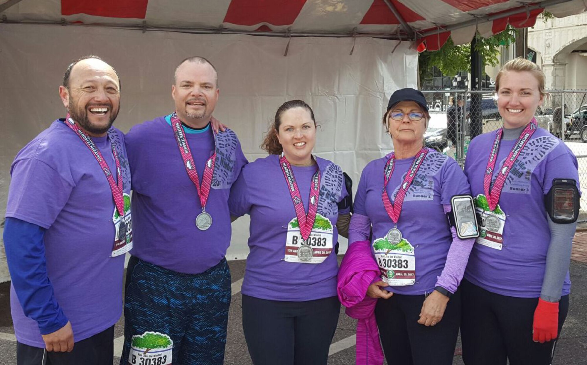 A team of runners from the Vance Airman & Family Readiness Center entered the Oklahoma City Memorial Marathon, April 30, and finished in 4 hours, 46 minutes. Team members are, from left, Angel Dominguez, Paul Williamson, Jessica Newton, Melody Pankonin and Linsey Van Ornum. (Courtesy photo)