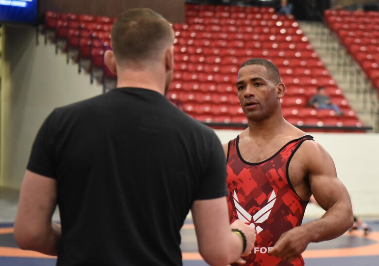 Sherwin Severin, Air Force Wrestling team member, gets advice during a match while competing in the Senior Greco-Roman World team trials in Las Vegas, Nev., April 29, 2017. Severin competed in two matches during the tournament. He is stationed at F.E. Warren Air Force Base, Wyo. (U.S. Air Force photo by Airman 1st Class Breanna Carter)