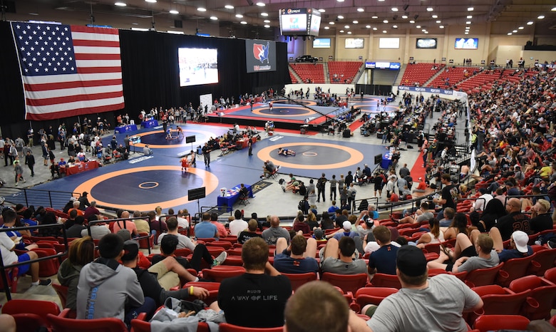 Fans watch multiple wrestling matches at the 2017 Open Wrestling Championships in Las Vegas, Nev., April 29, 2017. Those who qualify during this tournament will go on to compete for the United States against other countries. (U.S. Air Force photo by Airman 1st Class Breanna Carter)