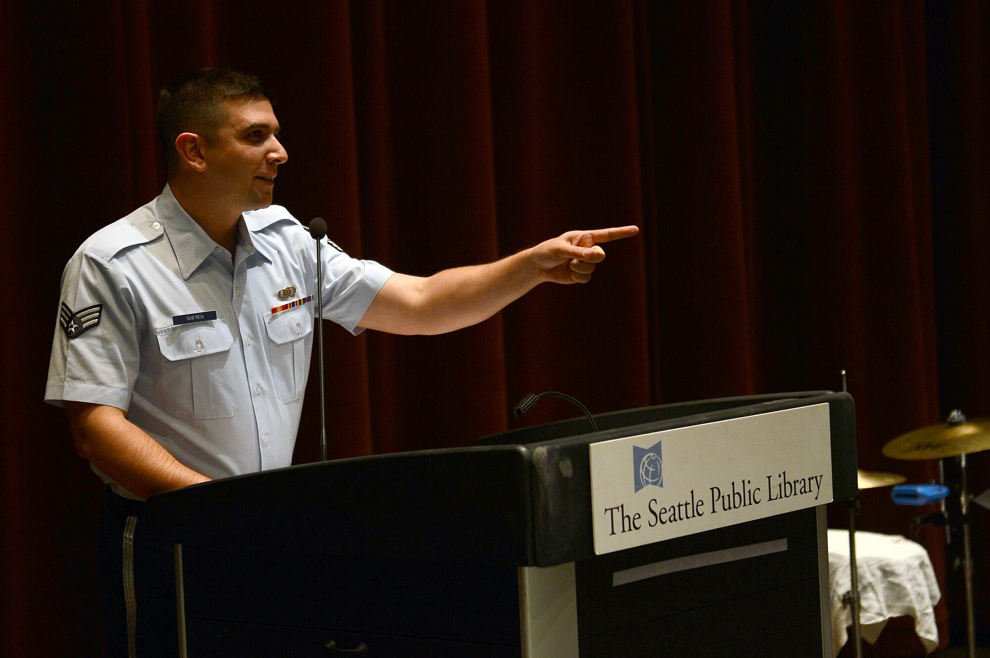 Senior Airman Daniel Shifren, U.S. Air Force Band of the Golden West bassoon player, introduces the Golden West Winds band to the audience during their performance May 1, 2017 in Seattle, Wash. The Golden West Winds is part of the U.S. Air Force Band of the Golden West stationed out of Travis Air Force Base, Calif. (U.S. Air Force photo/Senior Airman Divine Cox)
 
