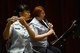 Master Sgt. Coreen Levin (center), Golden West Winds NCO in charge and oboe player, and Airman 1st Class Candy Chang (left), Golden West Winds flute player, perform for members of the Seattle community while on tour May 1, 2017 in Seattle, Wash. Levin and Chang are both from the Pacific Northwest Region. (U.S. Air Force photo/Senior Airman Divine Cox)
 
