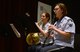 Airman 1st Class Hilary Zirkle (left), Golden West Winds clarinet player, and Airman 1st Class Emily Hoffner (center), french horn player, perform for members of the Seattle community while on tour May 1, 2017 in Seattle, Wash. Comprised of the flute, oboe, clarinet, french horn, and bassoon, this ensemble supports a wide variety of musical events which include public concerts, military ceremonies, patriotic shows, and educational programs. (U.S. Air Force photo/Senior Airman Divine Cox)