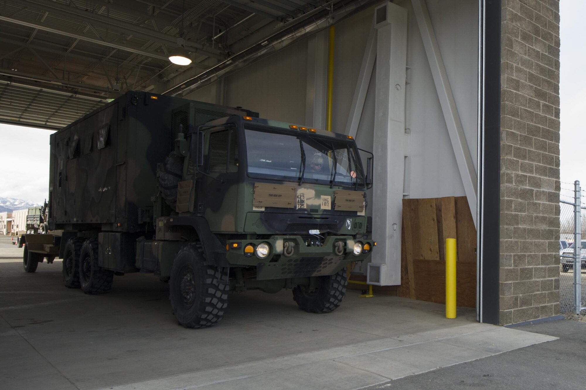 A Soldier waits for further instruction after weighing a vehicle at the Movement Control Center at Joint Base Elmendorf-Richardson, Alaska, May 2, 2017. (U.S. Air Force photo by Staff Sgt. Sheila deVera)