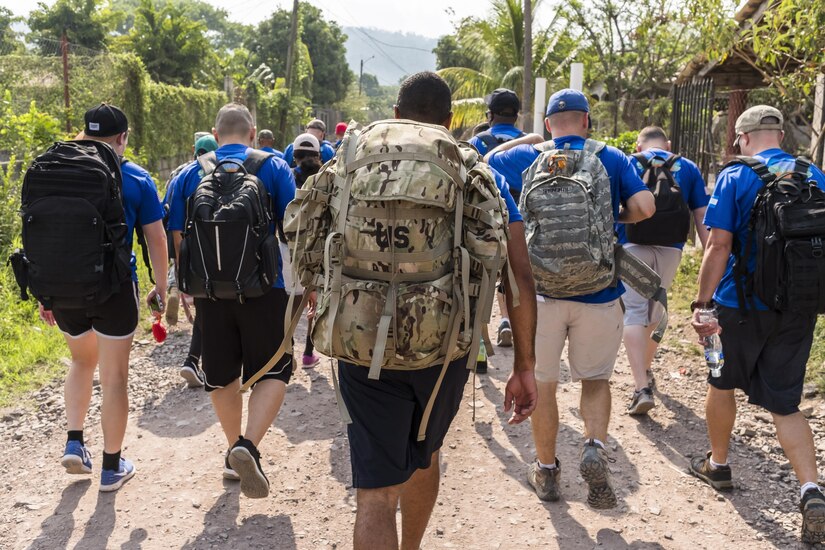 More than 190 members of Joint Task Force-Bravo hiked approximately 3.6 miles round-trip to the village of San Jerónimo, Comayagua, Honduras, Apr. 29, 2017. Members carried more than 5025 lbs of food and supplies, 24 soccer balls and 3 piñatas to the people of San Jerónimo. Chapel hikes have been occurring since 2003, with the JTF-Bravo Chapel sponsoring an average of six every year. The hikes are designed to provide a practical way for JTF-Bravo members to engage and partner with local communities to provide support to surrounding villages in need of food and supplies. (U.S. Air National Guard photo by Master Sgt. Scott Thompson/released)