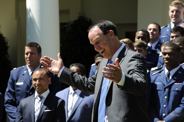 Troy Calhoun, the U.S. Air Force Academy's head football coach, graciously agrees with President Donald Trump to stay with the team May 2, 2017. Trump presented the team the Commander in Chief's Trophy, with Lt. Gen. Michelle D. Johnson, the U.S. Air Force Academy superintendent; Acting Secretary of the Air Force Lisa S. Disbrow; and Air Force Chief of Staff Gen. David L. Goldfein in attendance. (U.S. Air Force photo/Staff Sgt. Jannelle McRae)