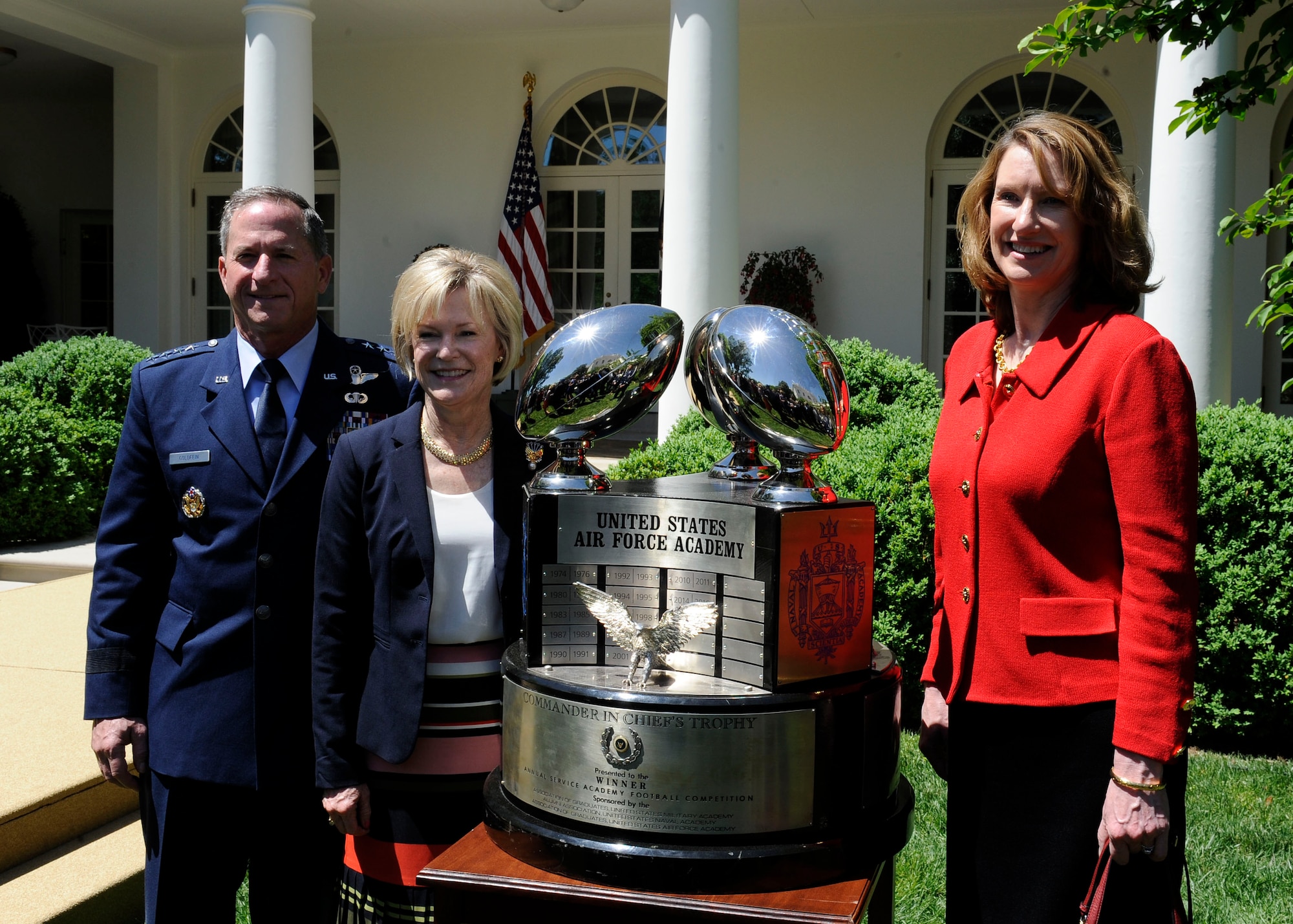 Air Force Chief of Staff Gen. David L. Goldfein, his wife, Dawn Goldfein and Acting Secretary of the Air Force Lisa S. Disbrow stand with the Commander -in -Chief's Trophy earned by the U.S. Air Force Academy at the White House, May 2, 2017. The Academy has earned the trophy 20 times. (U.S. Air Force photo/Staff Sgt. Jannelle McRae)