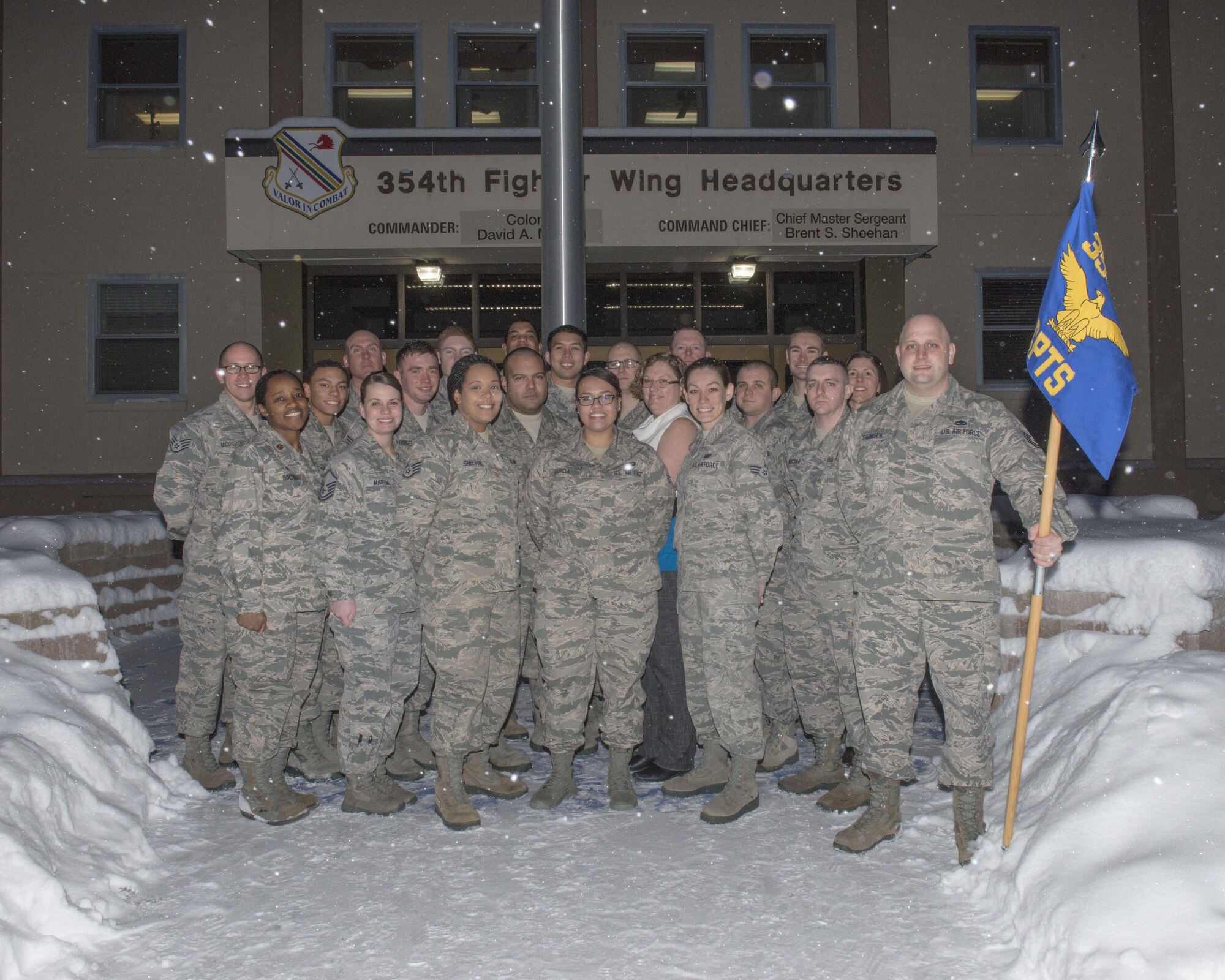 Members of the 354th Comptroller Squadron (CPTS) pose for a group photo, Dec. 21, 2016, at Eielson Air Force Base, Alaska. The 354th CPTS ensures travel vouchers are completed by hand,which reduced errors made by customers who used to complete their voucher on their own. (U.S. Air Force photo by Staff Sgt. Ashley Nicole Taylor)
