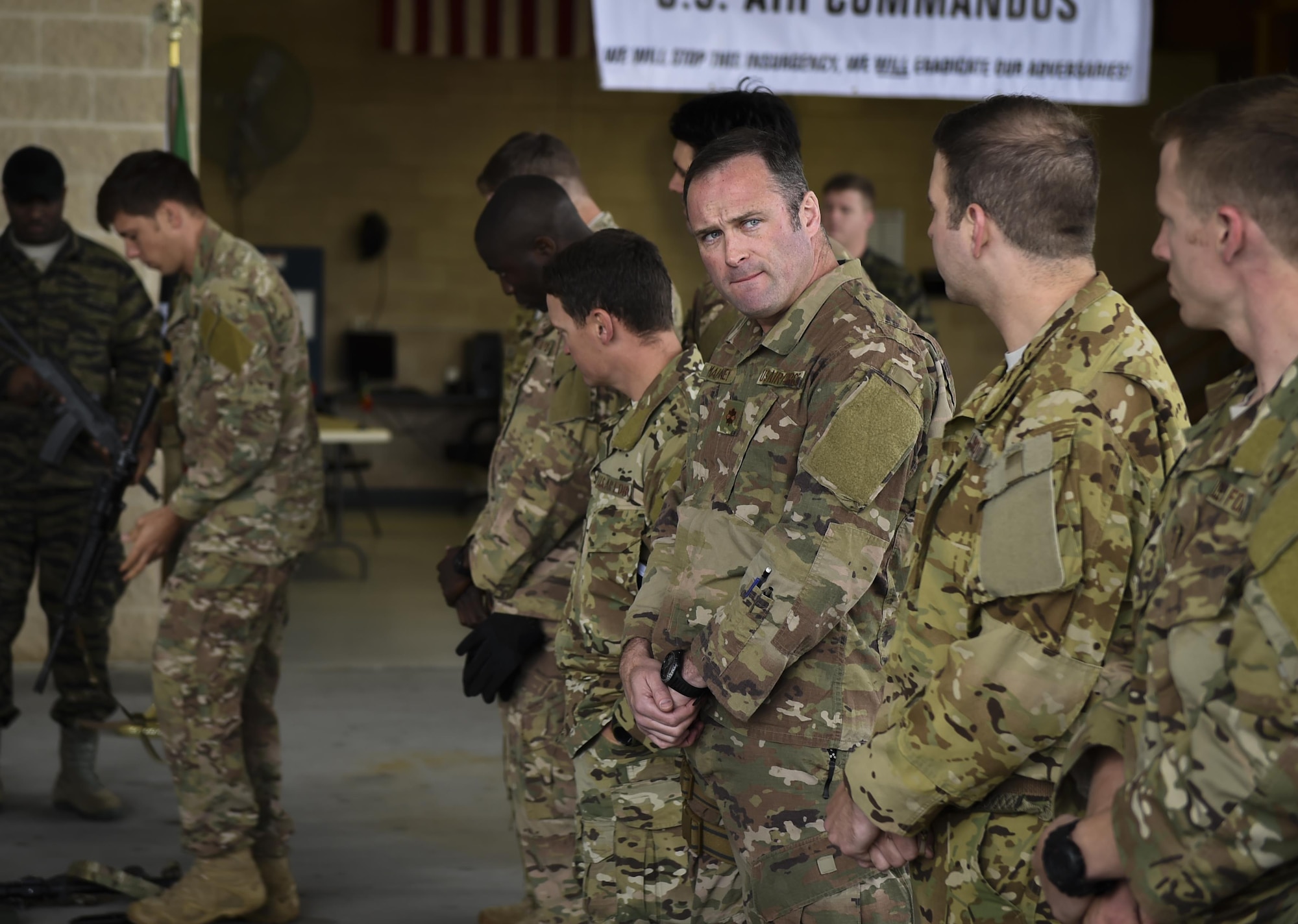 Combat aviation advisor students with the 6th Special Operations Squadron are in-processed to “Palmetto Land” during Operation Raven Claw at Duke Field, Fla., April 24, 2017. Students traveled to “Palmetto Land,” a simulated indigenous country, where they were tasked to train and assist the "Palmetto Land" forces in enhancing the tactical employment of its aircraft and soldiers. (U.S. Air Force photo by Airman 1st Class Joseph Pick)