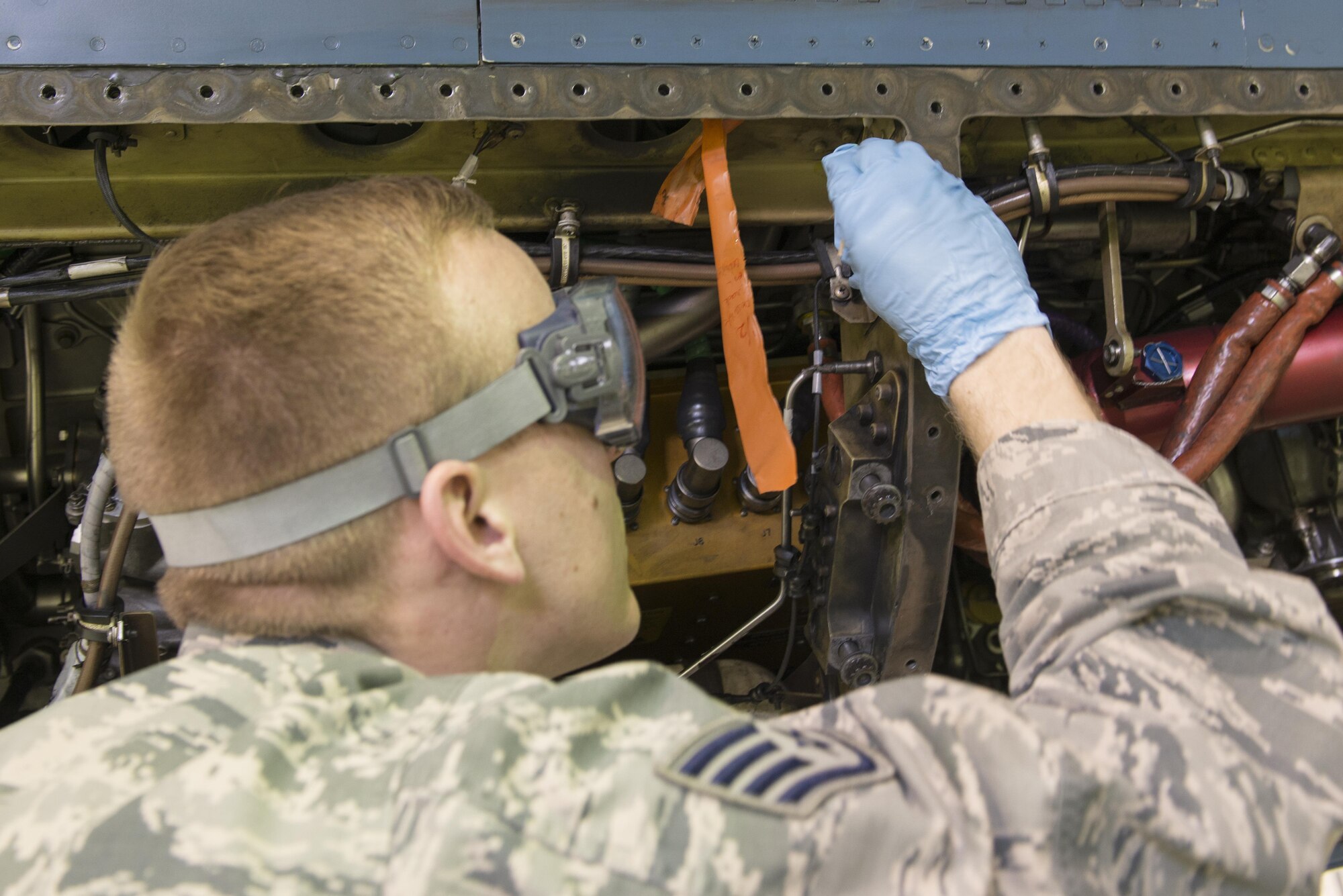 EIELSON AIR FORCE BASE, Alaska – U.S. Air Force Staff Sgt. Ricky Spanberger, a 354th Maintenance Squadron non-destructive inspector, applies a dye to check for potential cracks on an F-16 Fighting Falcon from the 18th Aggressor Squadron during NORTHERN EDGE 2017 (NE17), May 2, 2017, at Eielson Air Force Base, Alaska. NE17 is Alaska’s premier joint training exercise designed to practice operations, techniques and procedures as well as enhance interoperability among the services. Thousands of participants from all the services, Airmen, Soldiers, Sailors, Marines and Coast Guardsmen from active duty, Reserve and National Guard units are involved. (U.S. Air Force photo/Staff Sgt. Ashley Nicole Taylor)