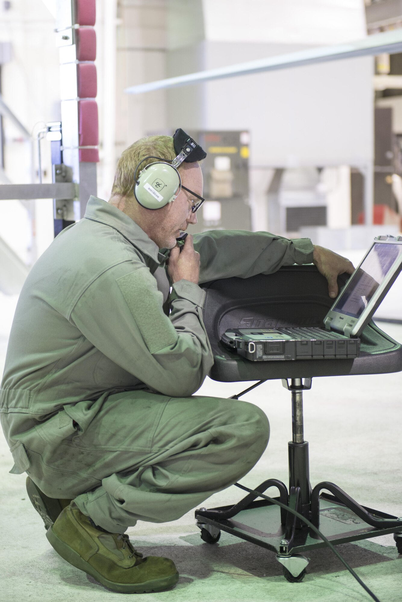 EIELSON AIR FORCE BASE, Alaska – U.S. Air Force civilian Michael Wilkerson, a 354th Maintenance Squadron phase mechanic 2, communicates with other members checking flight controls on an F-16 Fighting Falcon from the 18th Aggressor Squadron during NORTHERN EDGE 2017 (NE17), May 2, 2017, at Eielson Air Force Base, Alaska. NE17 is Alaska’s premier joint training exercise designed to practice operations, techniques and procedures as well as enhance interoperability among the services. Thousands of participants from all the services, Airmen, Soldiers, Sailors, Marines and Coast Guardsmen from active duty, Reserve and National Guard units are involved. (U.S. Air Force photo/Staff Sgt. Ashley Nicole Taylor)
