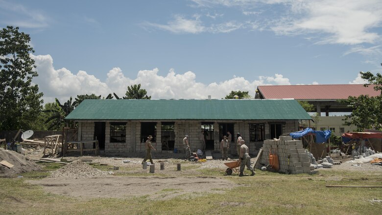U.S. military, Australian Army, and Armed Forces of the Philippines service members prepare to pour concrete during construction of a community building during Balikatan 2017 in Ormoc City, Leyte, April 29, 2017. Engineers from the three nations worked together to build new classrooms at Margen Elementary School in Ormoc City. Balikatan is an annual U.S.-Philippine military bilateral exercise focused on a variety of missions, including humanitarian assistance and disaster relief, counterterrorism, and other combined military operations. 
